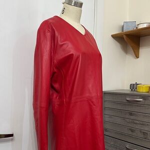Dress to kill with this beauty Red Leather V-Neck Dress